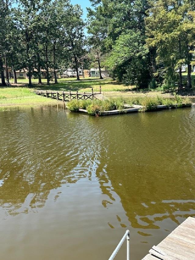 view of dock with a water view