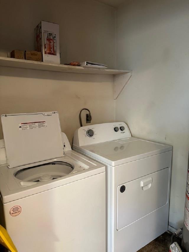 laundry room with separate washer and dryer