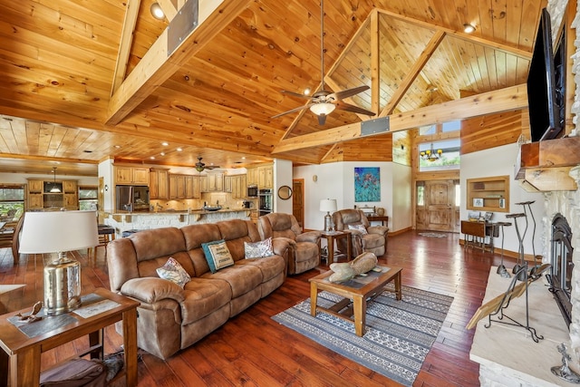 225 Mcgregor Dr, Brookeland, TX 75931 - living area with ceiling fan, wood ceiling, beamed ceiling, and hardwood / wood-style floors