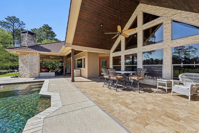 225 Mcgregor Dr, Brookeland, TX 75931 - view of patio / terrace with an outdoor pool and ceiling fan