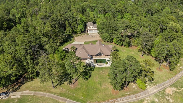 225 Mcgregor Dr, Brookeland, TX 75931 - bird's eye view with a wooded view
