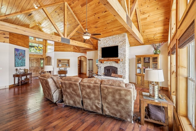 225 Mcgregor Dr, Brookeland, TX 75931 - living area with wood ceiling, beam ceiling, a ceiling fan, and arched walkways