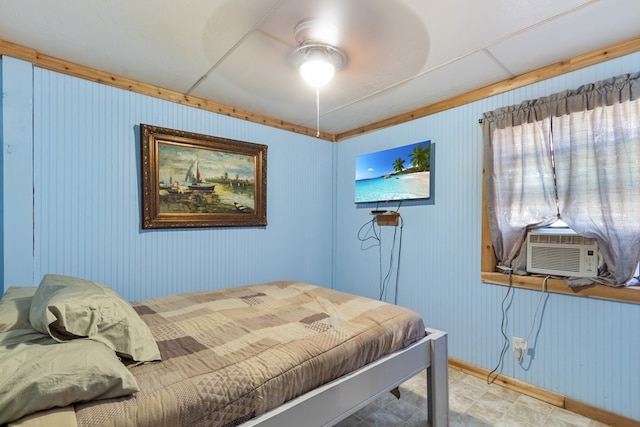 bedroom featuring ceiling fan and cooling unit