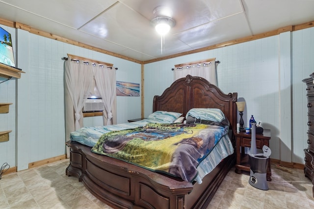 bedroom featuring ceiling fan and cooling unit