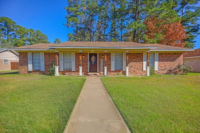 ranch-style house with a front lawn