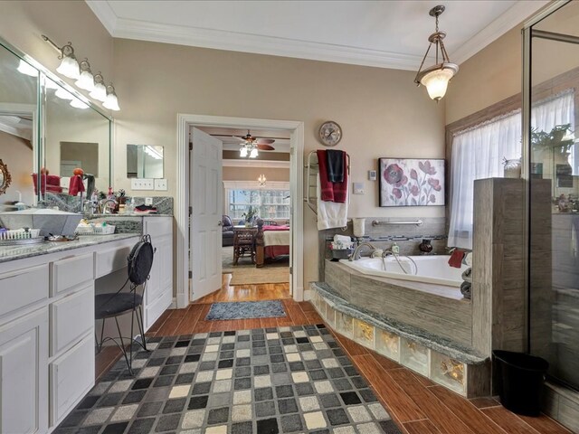 full bathroom featuring vanity, ornamental molding, connected bathroom, and wood finish floors