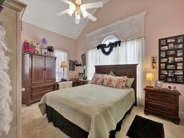 bedroom featuring high vaulted ceiling, light colored carpet, and ceiling fan