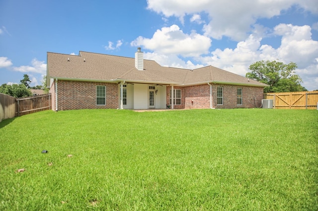113 Westfield Loop, Lufkin, TX 75904 - rear view of property with brick siding, a fenced backyard, a chimney, and a patio area
