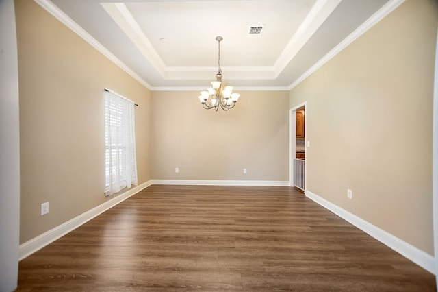 113 Westfield Loop, Lufkin, TX 75904 - unfurnished room with a tray ceiling, a chandelier, dark wood-type flooring, and crown molding