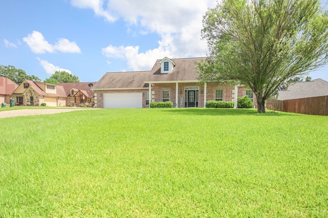 113 Westfield Loop, Lufkin, TX 75904 - new england style home with a garage, brick siding, and concrete driveway