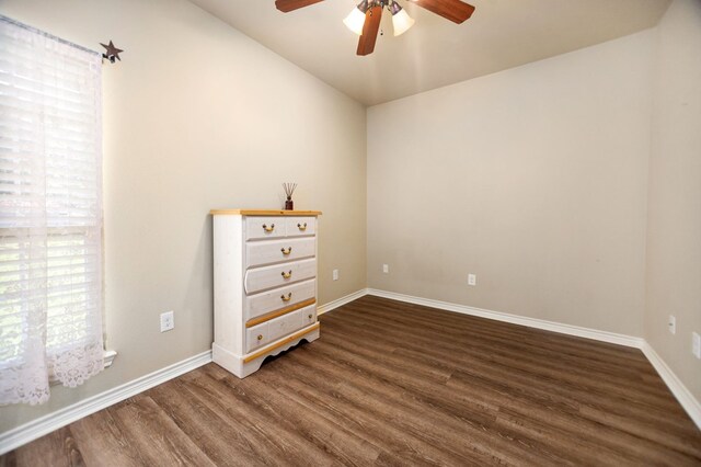 113 Westfield Loop, Lufkin, TX 75904 - unfurnished room with a ceiling fan, dark wood finished floors, and lofted ceiling