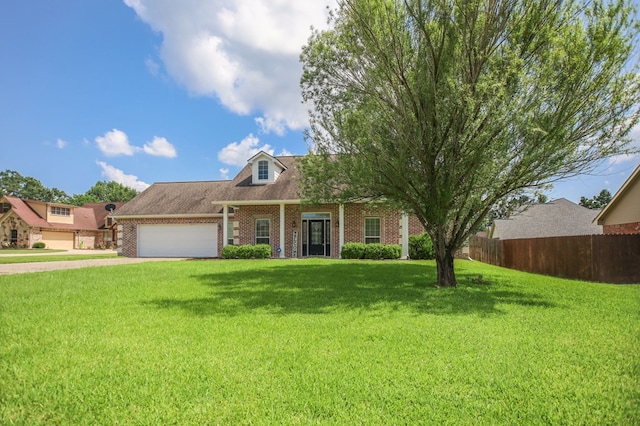 113 Westfield Loop, Lufkin, TX 75904 - cape cod-style house featuring brick siding, a garage, and driveway
