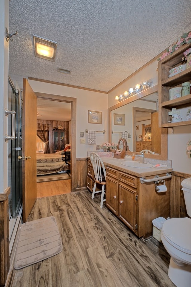 2105 Carters Ferry Rd, E Road, Milam, TX 75959 - ensuite bathroom with ensuite bathroom, toilet, a stall shower, and a textured ceiling