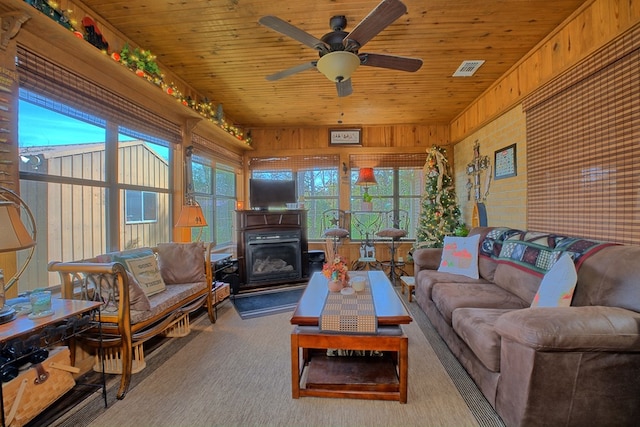 2105 Carters Ferry Rd, E Road, Milam, TX 75959 - living area with carpet flooring, a ceiling fan, wooden ceiling, and visible vents