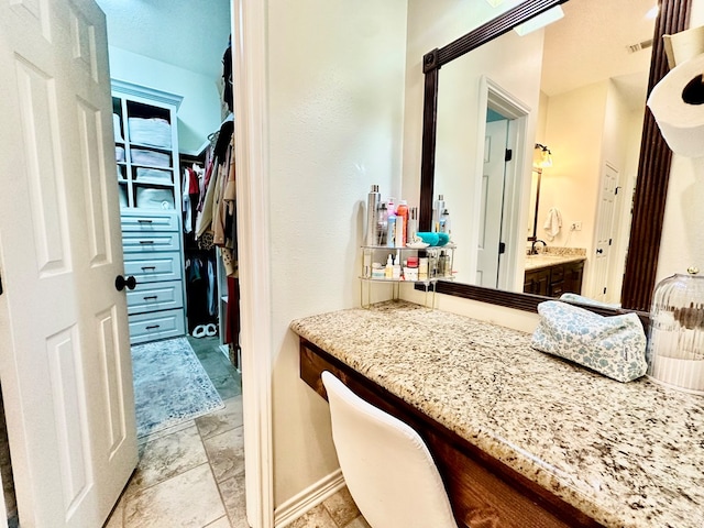 4815 Fm 2827, Warren, TX 77664 - bathroom with vanity and a walk in closet