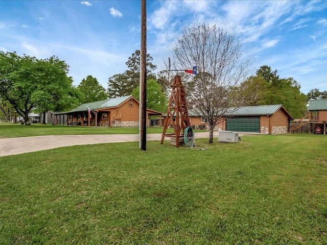 view of yard with a garage