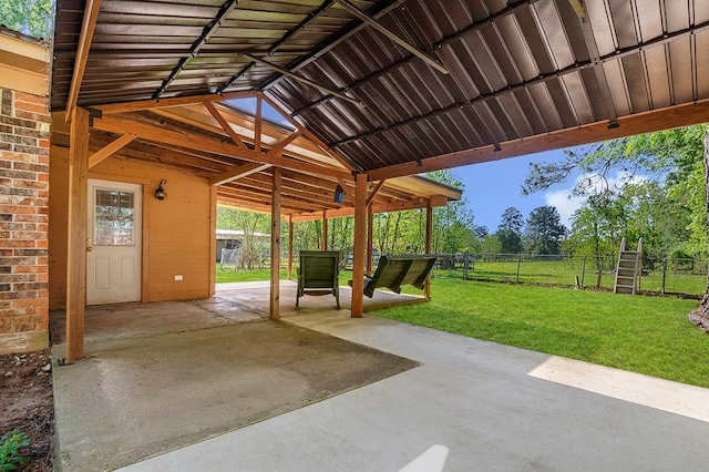 view of patio featuring fence