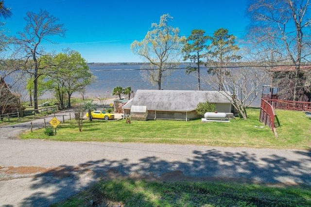 property view of water with fence