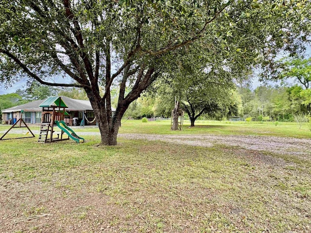 view of yard with a playground