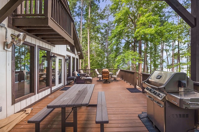 130 Boxwood Ln, Brookeland, TX 75931 - wooden terrace featuring outdoor dining area and grilling area