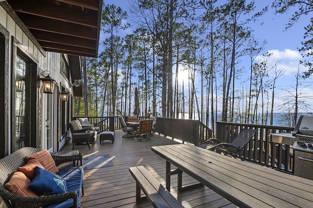 130 Boxwood Ln, Brookeland, TX 75931 - wooden terrace featuring outdoor dining space