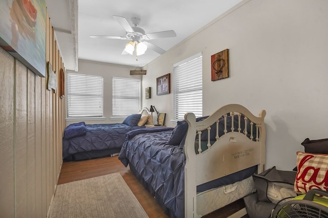 130 Boxwood Ln, Brookeland, TX 75931 - bedroom with wood finished floors, ceiling fan, and ornamental molding