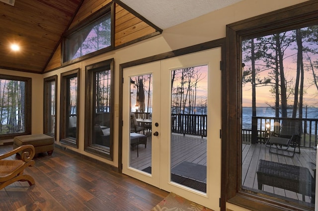 130 Boxwood Ln, Brookeland, TX 75931 - entryway featuring a water view, dark wood-style floors, french doors, lofted ceiling, and wood ceiling