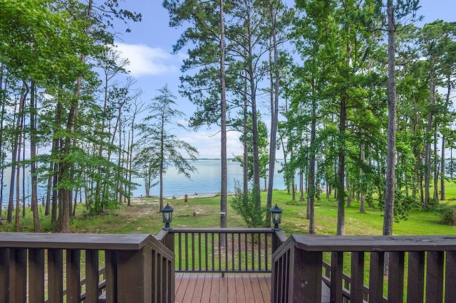 130 Boxwood Ln, Brookeland, TX 75931 - deck with a water view and a lawn