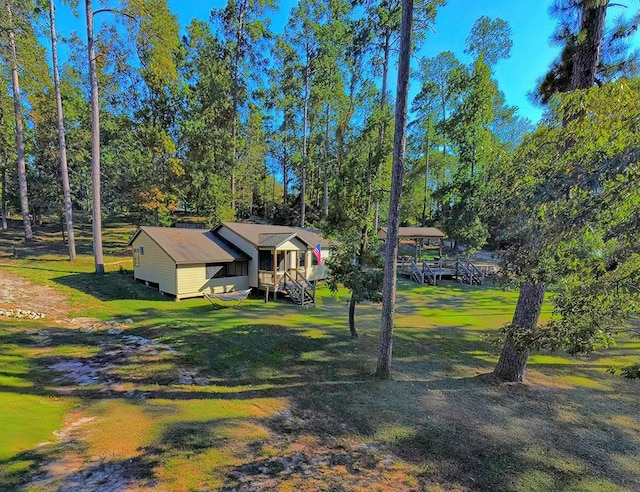 exterior space with a front lawn