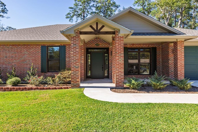 property entrance featuring a yard