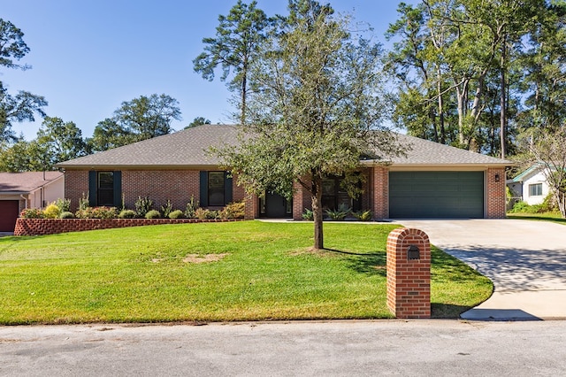 ranch-style home featuring a garage and a front yard