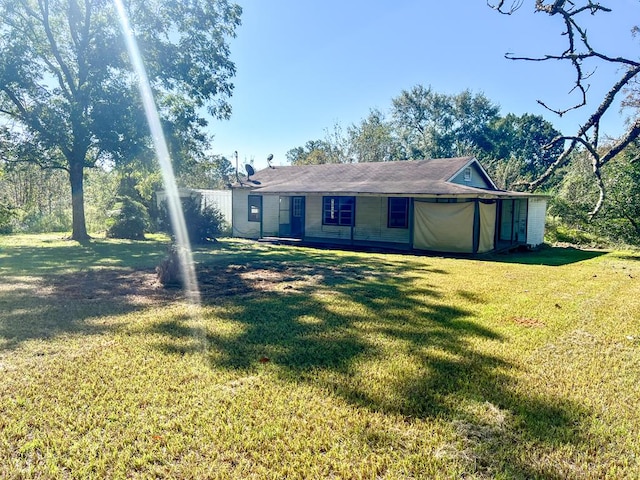 view of front of home with a front yard