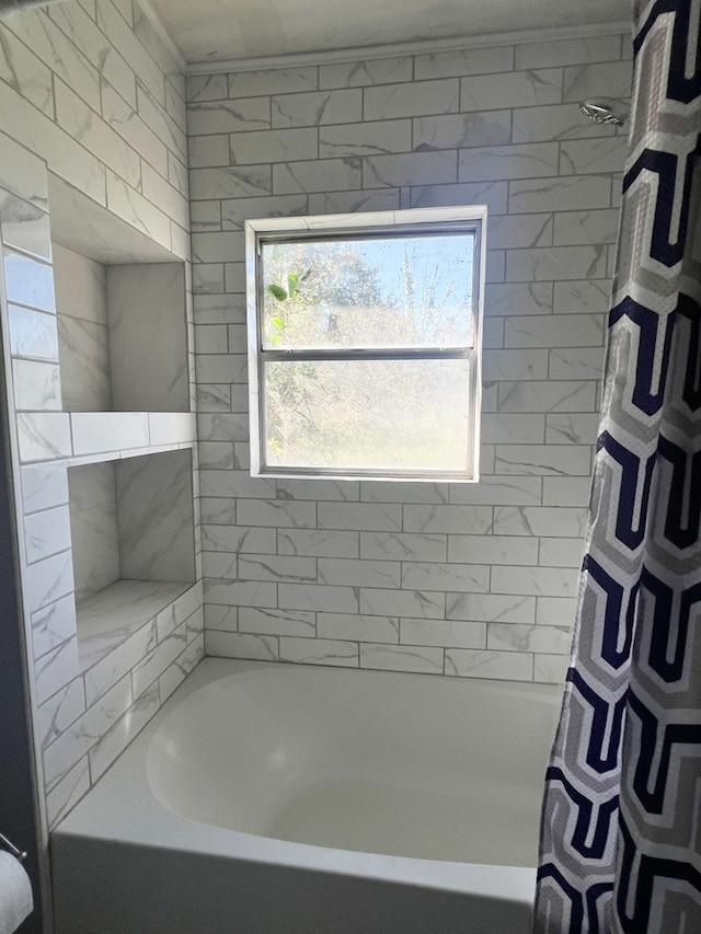 bathroom featuring shower / tub combo