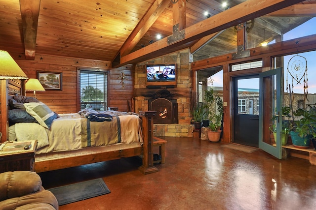 bedroom with vaulted ceiling with beams, wooden walls, a fireplace, and wooden ceiling