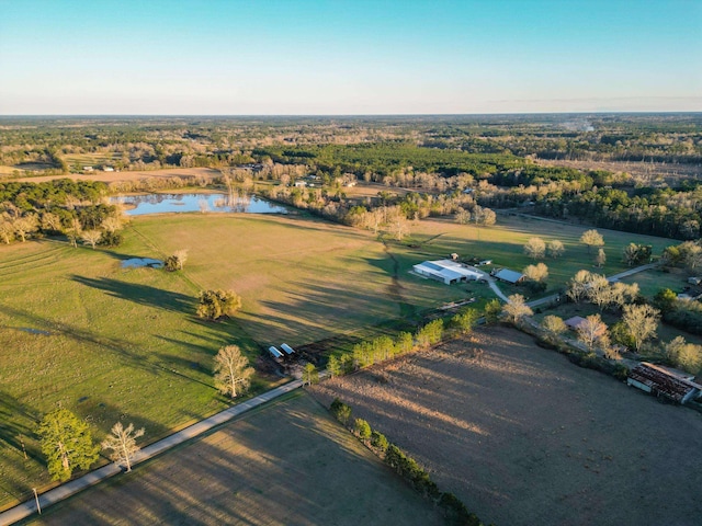 aerial view featuring a rural view and a water view