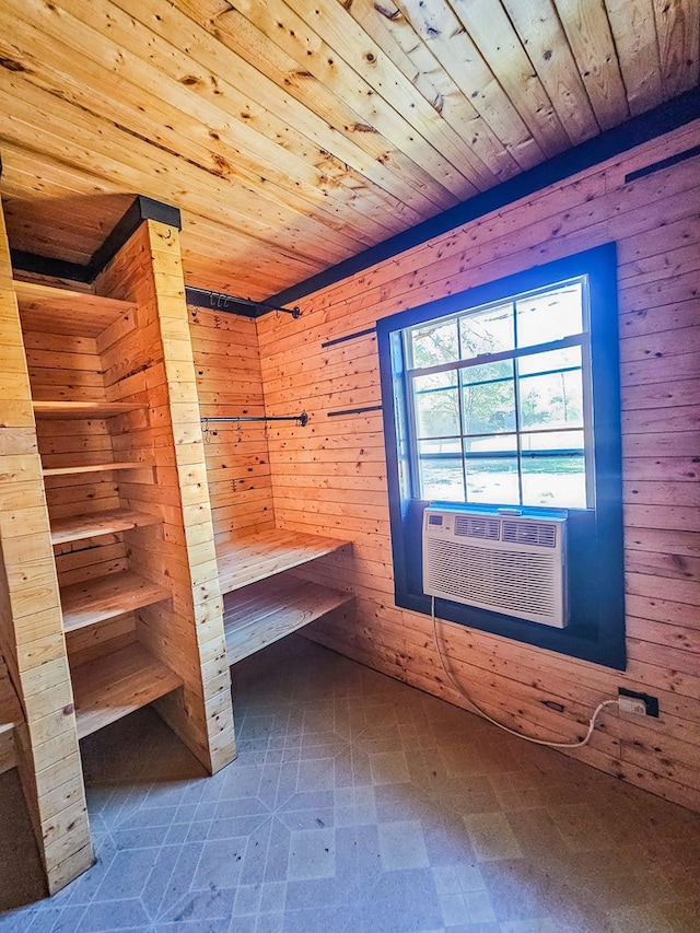 1026 Berry Rd, Lufkin, TX 75904 - sauna with wood ceiling, wood walls, and tile patterned floors