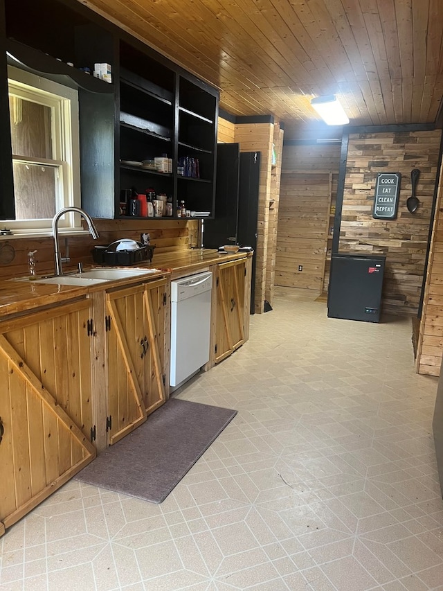 1026 Berry Rd, Lufkin, TX 75904 - kitchen featuring dishwasher, wood walls, wooden ceiling, open shelves, and light floors
