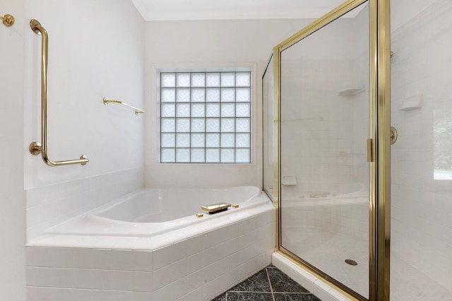 bathroom with separate shower and tub and ornamental molding