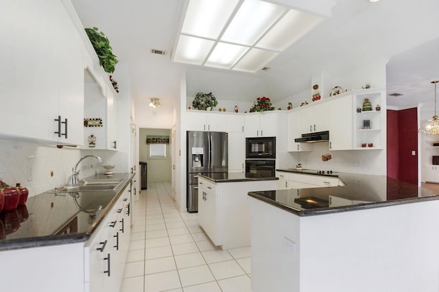 kitchen featuring a center island, black appliances, sink, white cabinetry, and kitchen peninsula