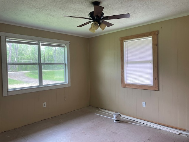 149 County Road 355, Jasper, TX 75951 - spare room featuring a textured ceiling, ceiling fan, and crown molding