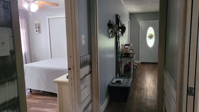 corridor featuring dark hardwood / wood-style floors