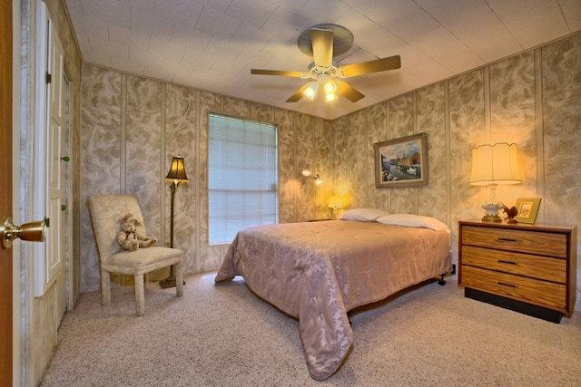 carpeted bedroom with a ceiling fan