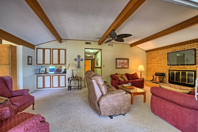 living area with ceiling fan, carpet flooring, vaulted ceiling with beams, and visible vents