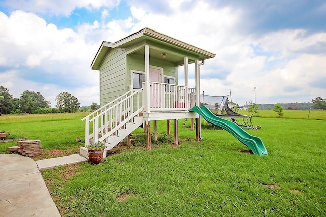 view of play area featuring a yard