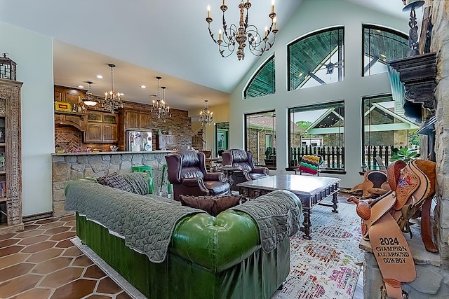 tiled living room featuring high vaulted ceiling and a notable chandelier