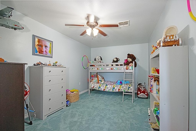 carpeted bedroom featuring ceiling fan