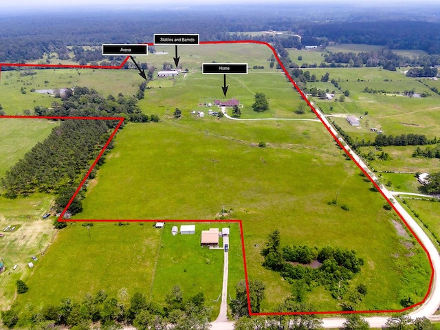 birds eye view of property featuring a rural view