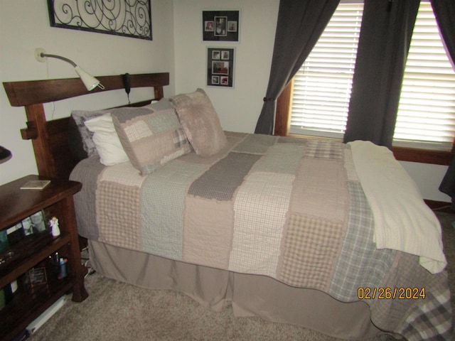 bedroom featuring carpet flooring