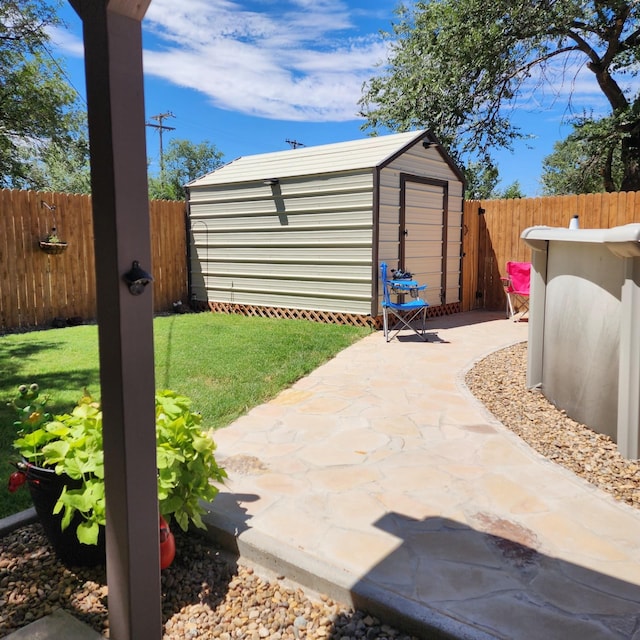 view of patio / terrace with a storage shed