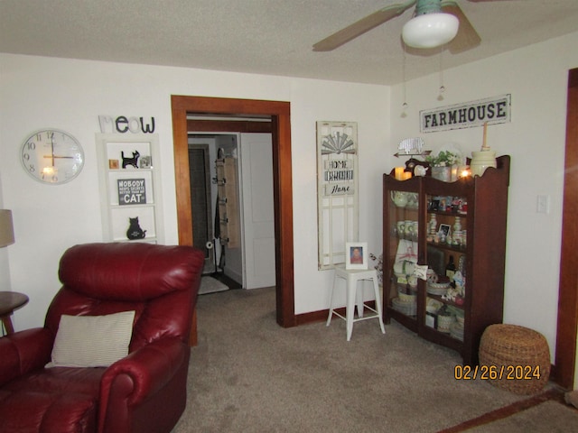 interior space with ceiling fan